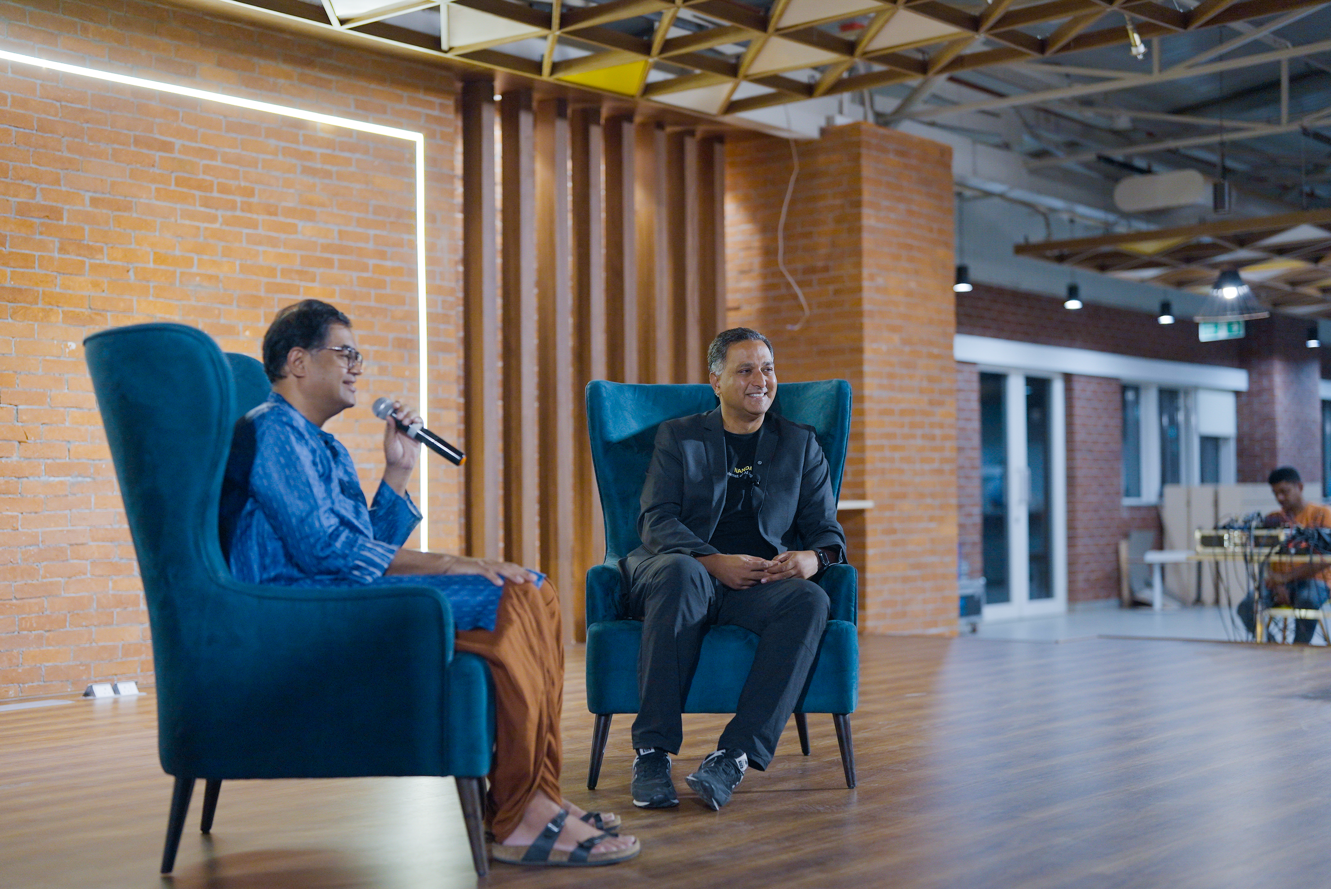 Speaker presenting at a Bharat1.ai event